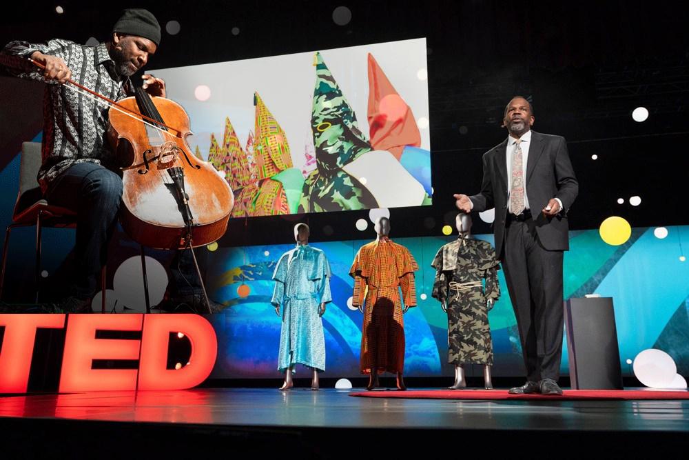 Photo of Paul Rucker, a black man, playing Cello on a TED talk stage; blending into a photo of Paul Rucker giving a speech about KKK robe designs on a TED talk stage