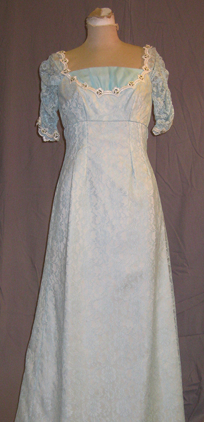 white empire-waisted dress.