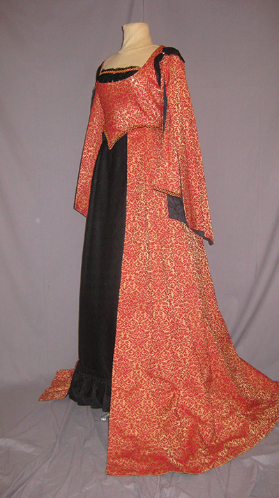 Coral patterned dress with full sleeves and a black skirt panel in front