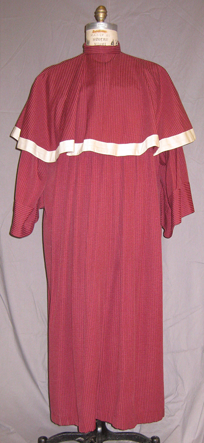 cardinal's robe with white-trimmed shoulder cape