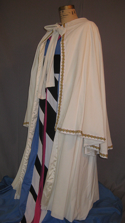 white cloak with cape, bow tie at neck
