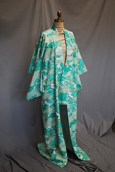 turquoise and white patterned robe