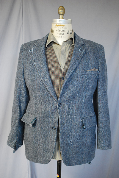 Threadbare grey tweed jacket, brown wool vest, grey shirt