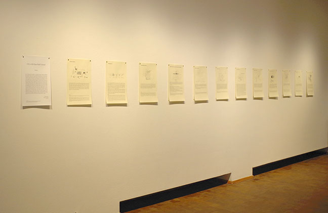 A horizontal row of 10 drawings. White wall, white paper.