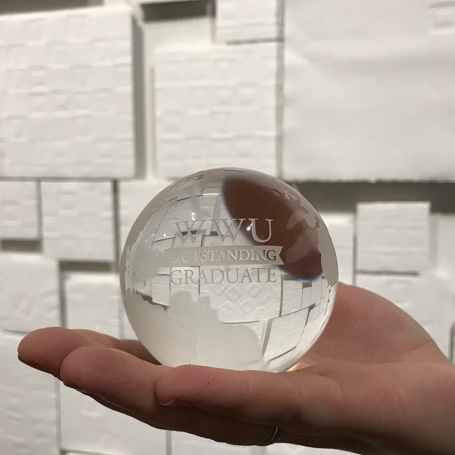 closeup of outstanding graduate award - a glass sphere