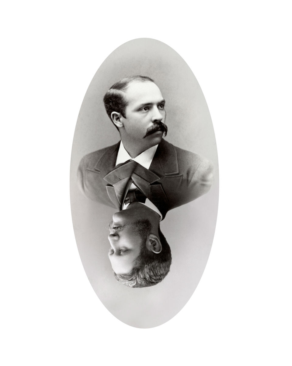 an altered vintage photo of two men&#039;s portraits inverted and joined at the shoulders (one is upside down)