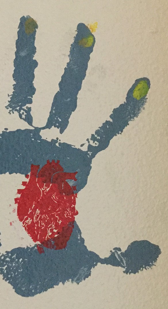 blue handprint with a painted anatomical heart in the palm