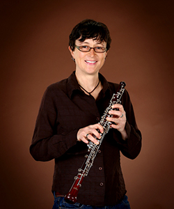 Jennifer Weeks holding an oboe