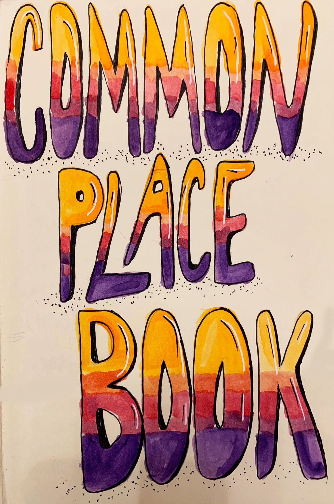 handwritten words in colorful ink: "Common place book"