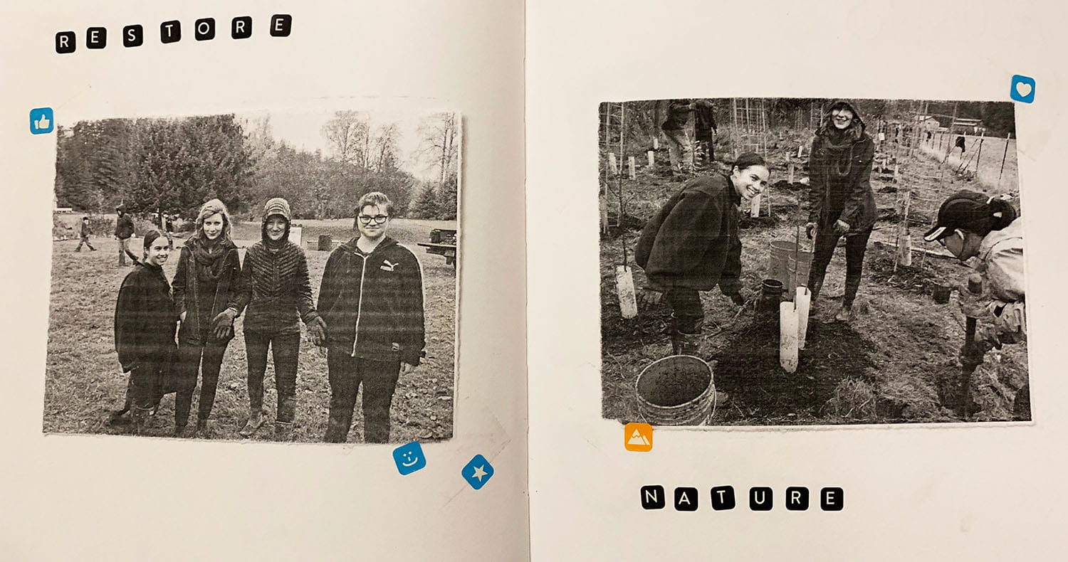 photos of people outside and planting trees, affixed to blank pages in a book, titled "restore" and "nature"