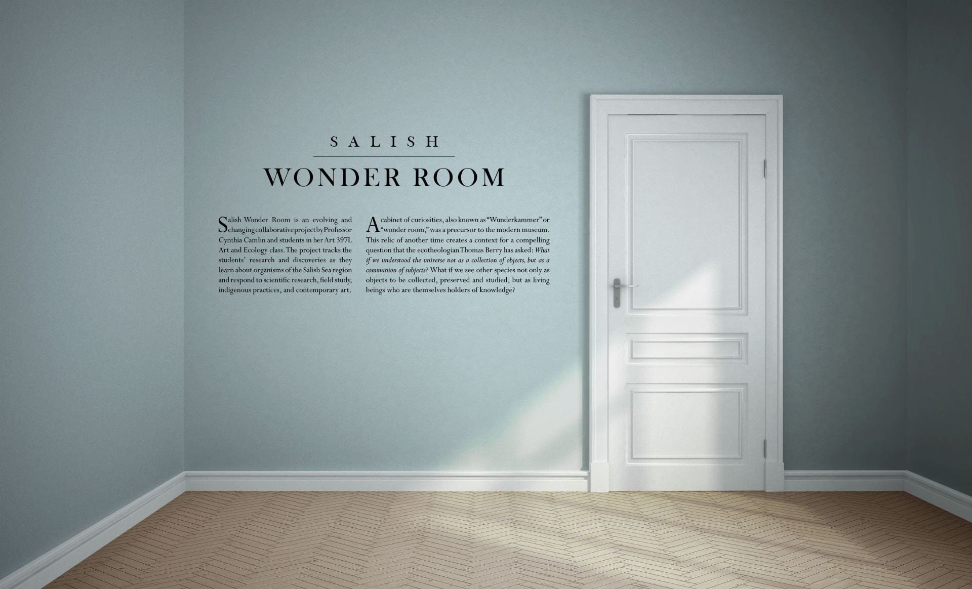 a closed door in an empty room. On the wall next to it, the words Salish Wonder Room, and more text underneath that which is too small to read