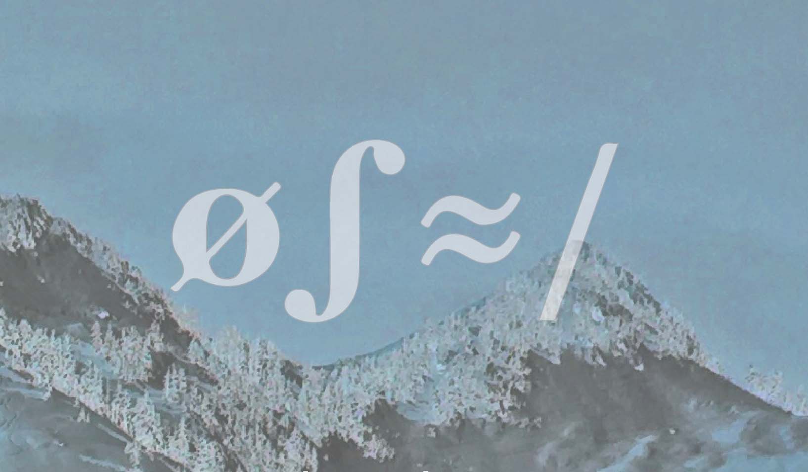 grainy icy mountains and blue sky with four mathematical symbols in a serif font