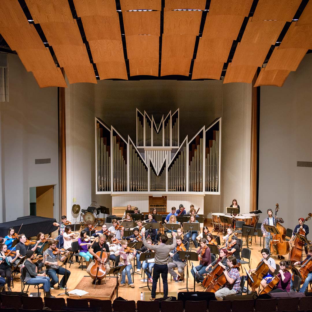 An orchestra playing in Wester's PAC Concert Hall