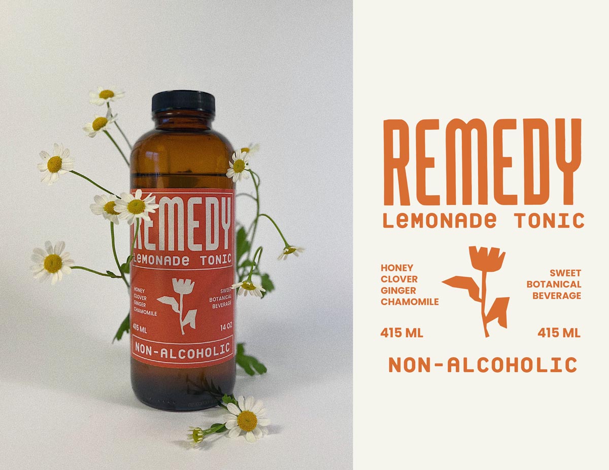 advertisement for Remedy lemonade tonic shows a bottle with small flowers arranged behind it