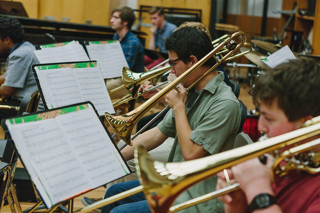 Trombone section during band rehearsal.