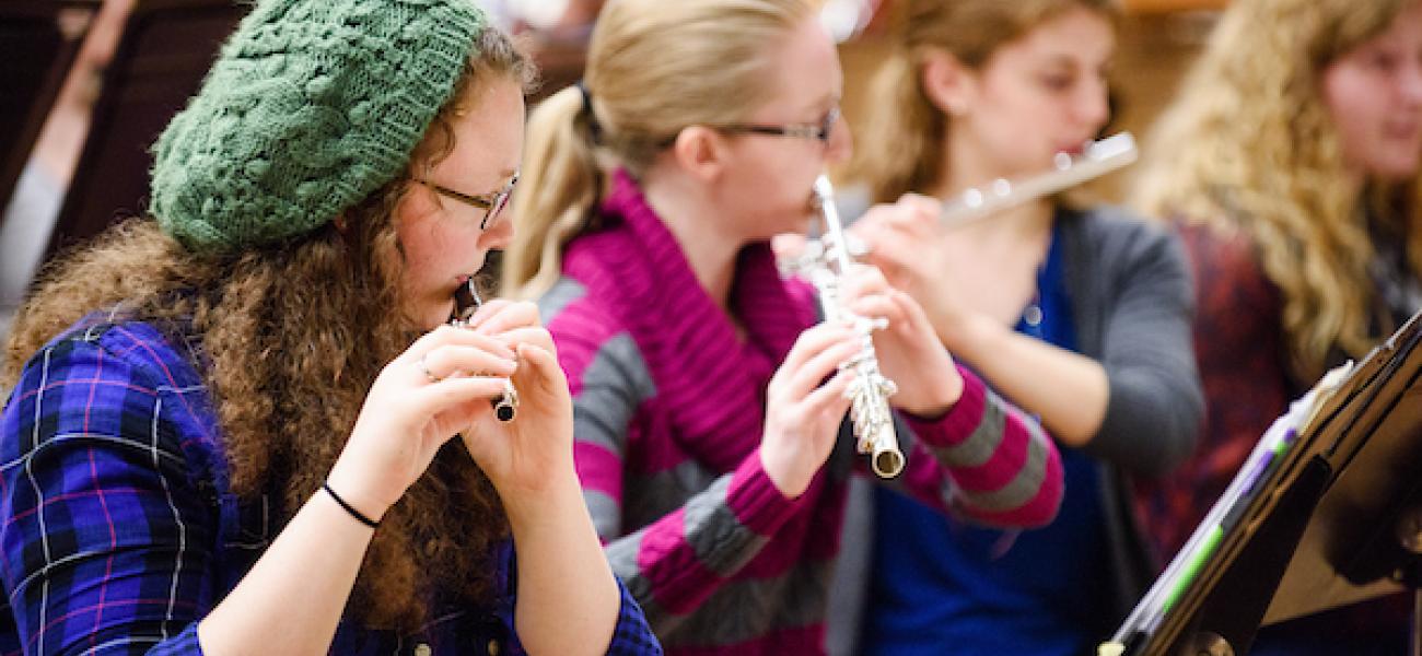 Close-up of women playing flutes in the Western Band
