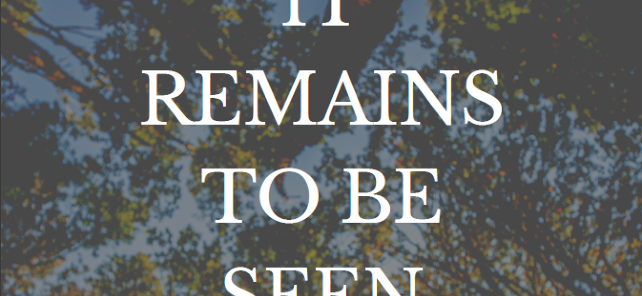 Looking up at tree tops from under the trees. Text over the image reads "It Remains to be Seen"