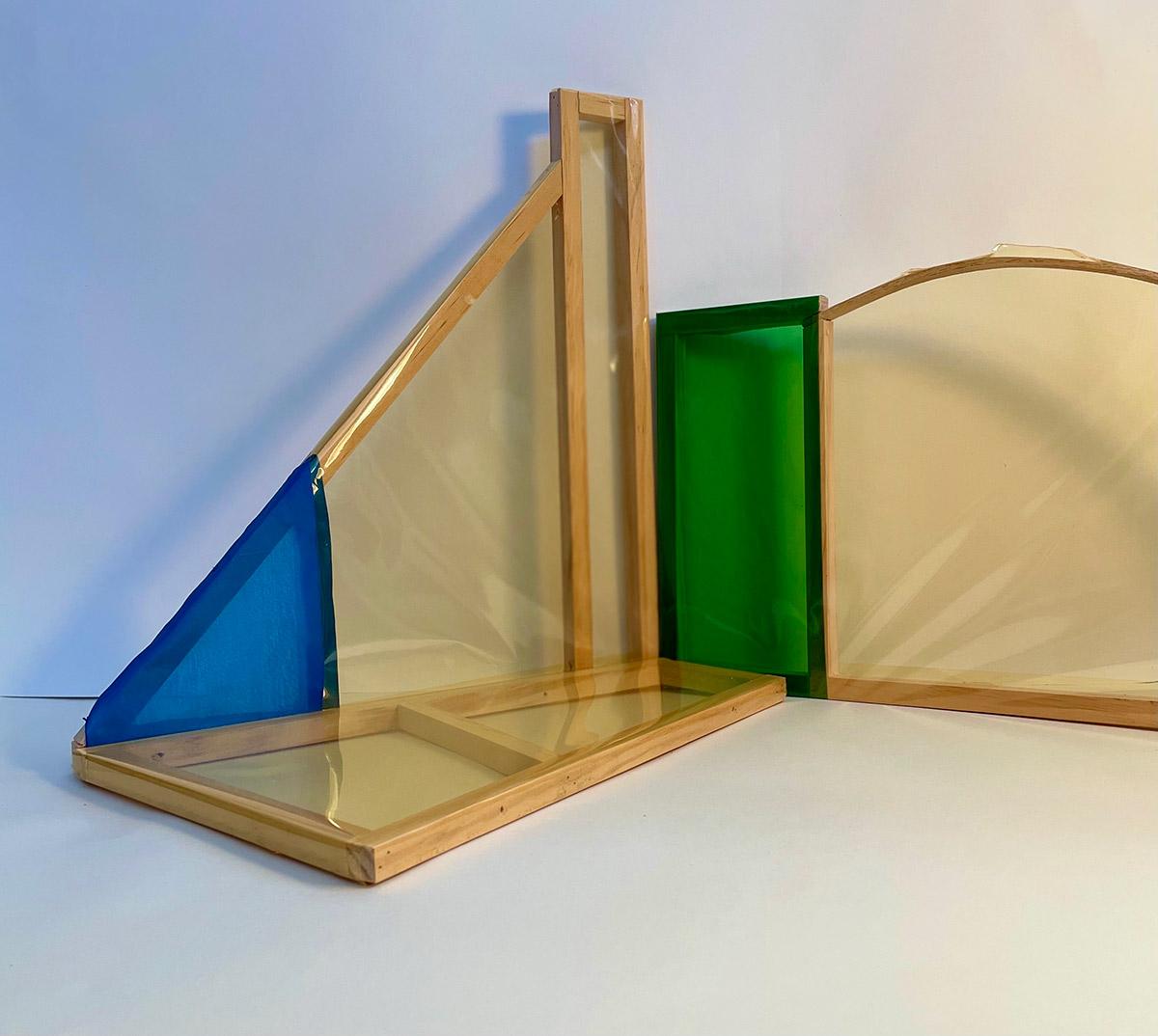 three dimensional geometric shapes in wood and plastic film