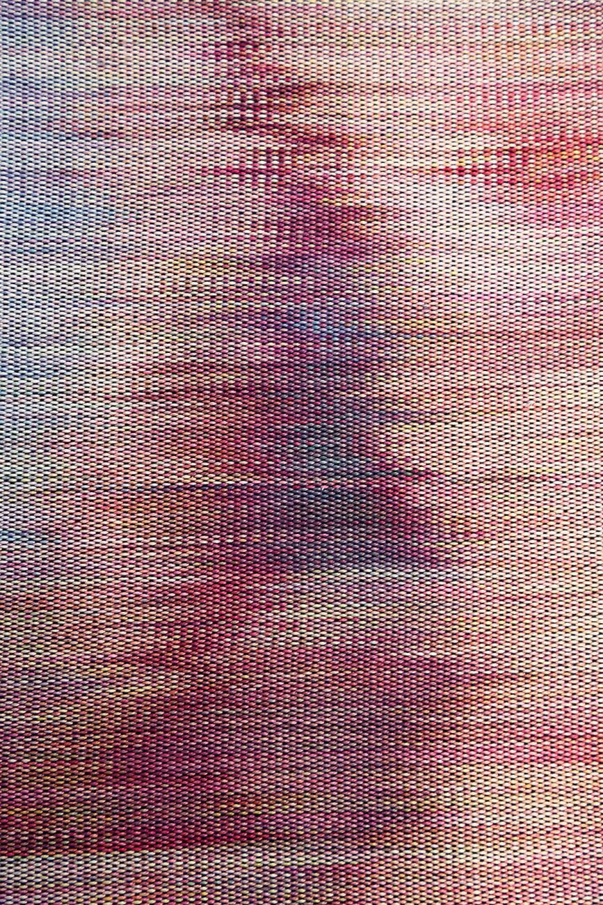 woven fabric suggesting an indistinct image of a body part